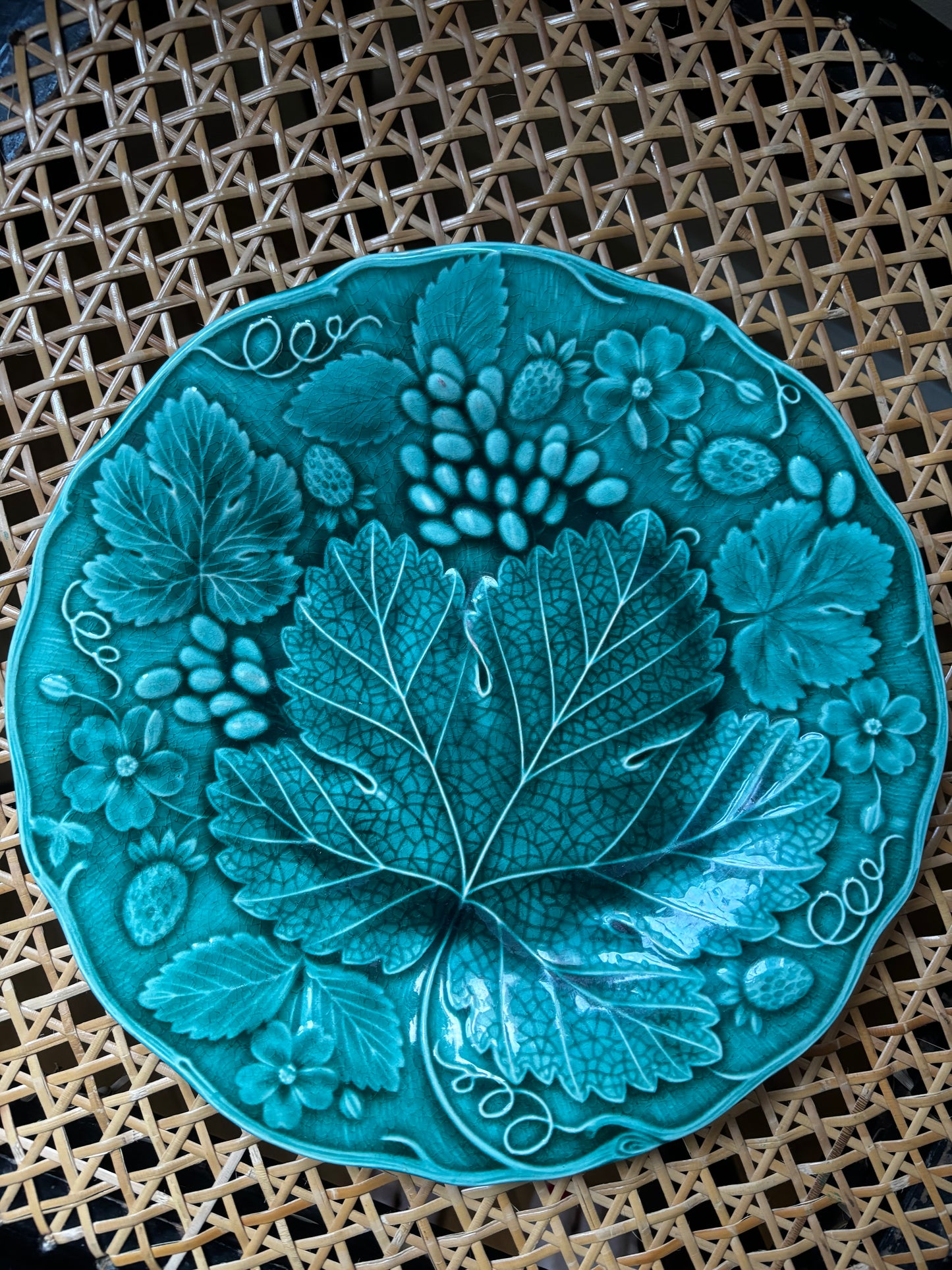 Set of four Majolica plates