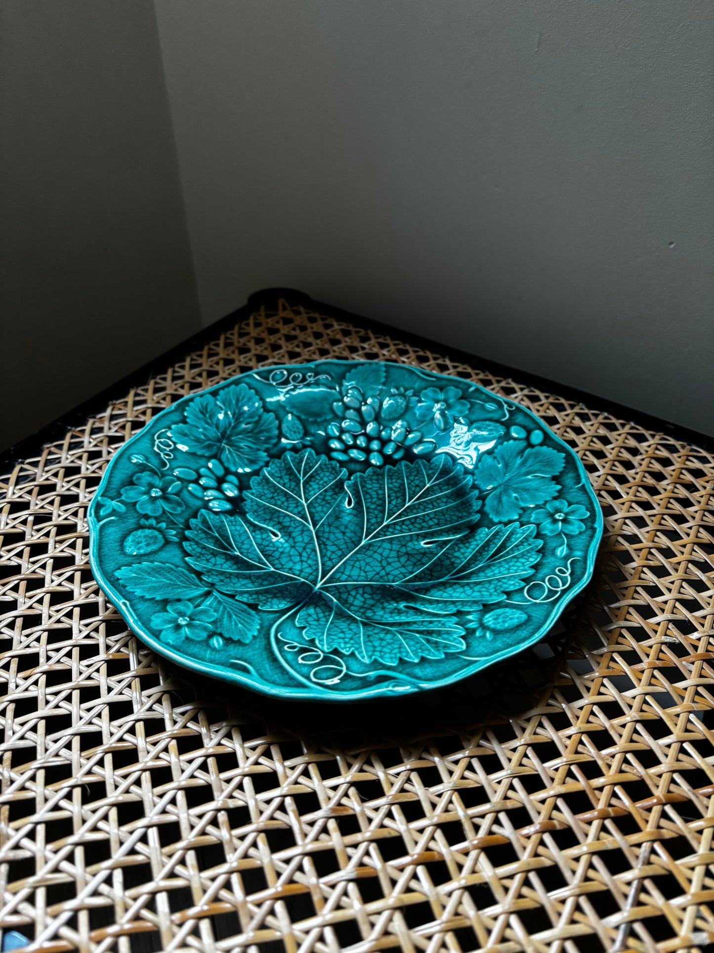 Set of four Majolica plates