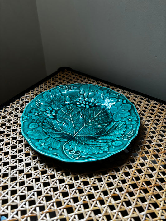 Set of four Majolica plates