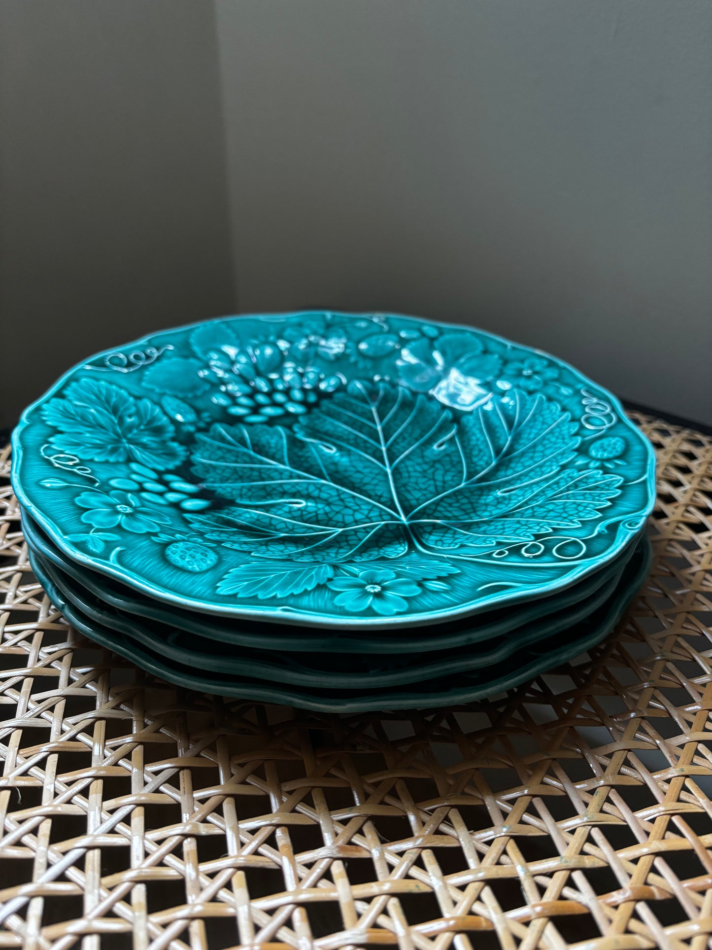 Set of four Majolica plates
