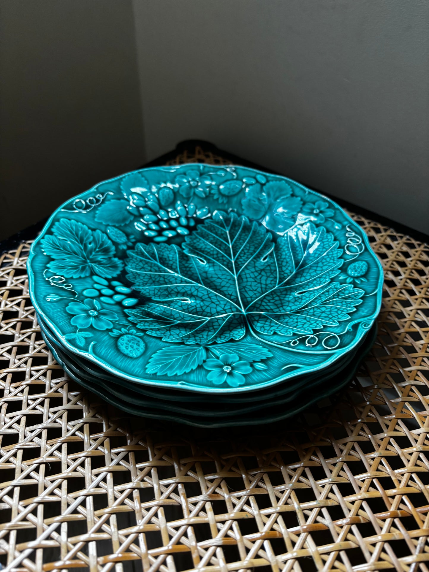 Set of four Majolica plates